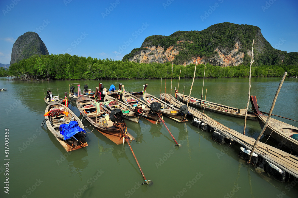 Fishing Boats background  the mountain view. Fishing boat for fishermen in southern Thailand.