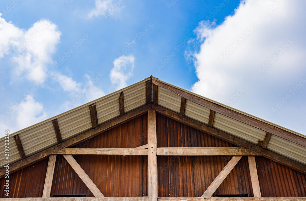 Gable of wooden houses and galvanized walls Gable of wooden houses and galvanized walls