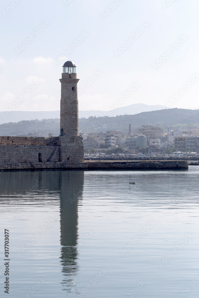 The old lighthouse in the evening light (city Rethymno, island Crete, Greece)