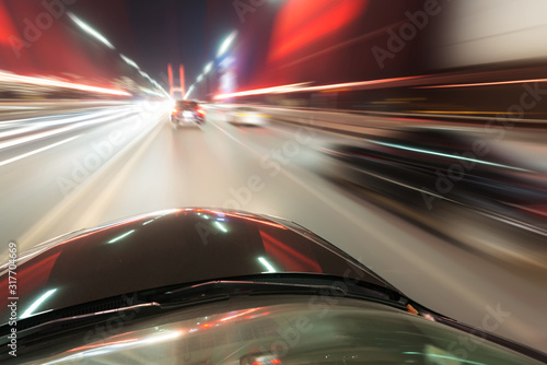 car on the road with motion blur background © zorabc