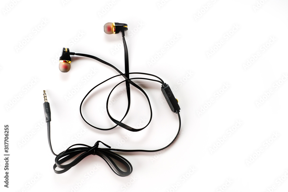 Black vacuum headphones with headset shot on a white background Black vacuum headphones with headset shot on a white background