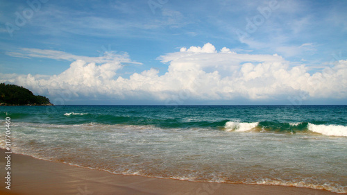 Karon beach, tranquil sea and wonderful cloudy sky, Phuket, Thailand