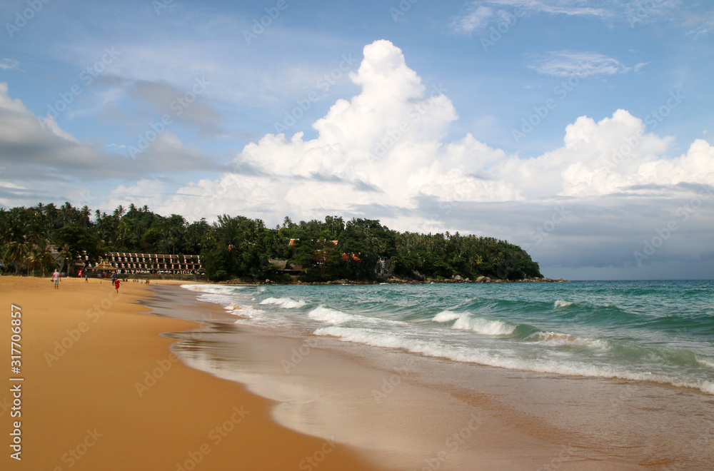 Karon beach, tranquil sea and wonderful cloudy sky, Phuket, Thailand Karon beach, tranquil sea and wonderful cloudy sky, Phuket, Thailand