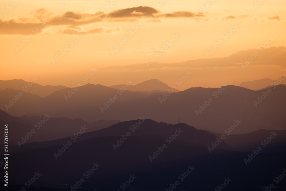 Beautiful sunrise light hits the mountains