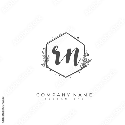 Handwritten initial letter R N RN for identity and logo. Vector logo template with handwriting and signature style.