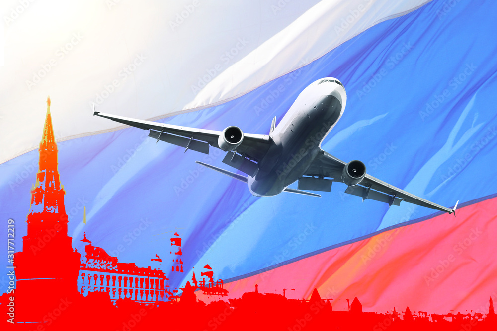 flying plane on the background of the Russian flag, in the background of the red square forces