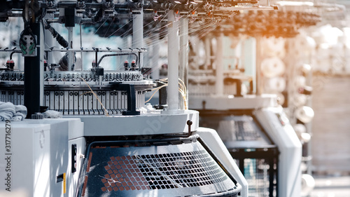 Textile Manufacturing. Circular knitted fabric. Textile factory in spinning production line and a rotating machinery and equipment production company. Clothing industry. Manufacturing textile fabrics.