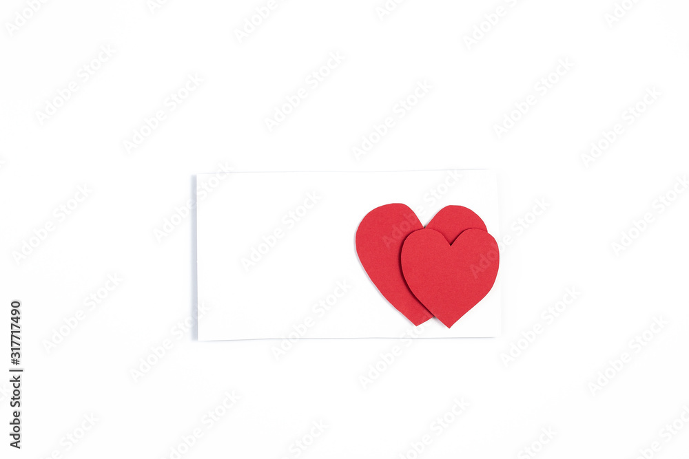 Happy Valentine's day greetings. red paper heart on white.