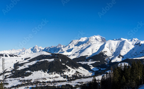 Mont Blanc (in background) and Saint-Gervais ski resort (in foreground) during winter season - View from Megeve, Haute-Savoie, Rhone-Alpes, France © Nicolas Viard