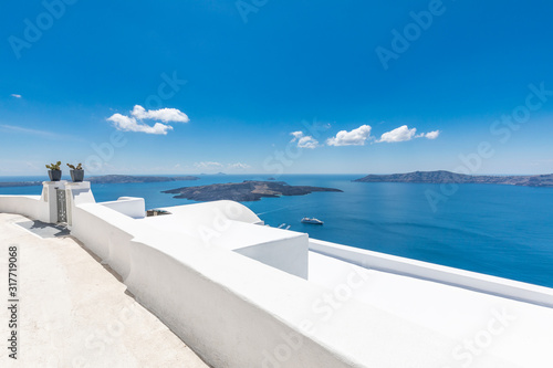  White architecture on Santorini island, Greece. Beautiful summer landscape, sea view. 