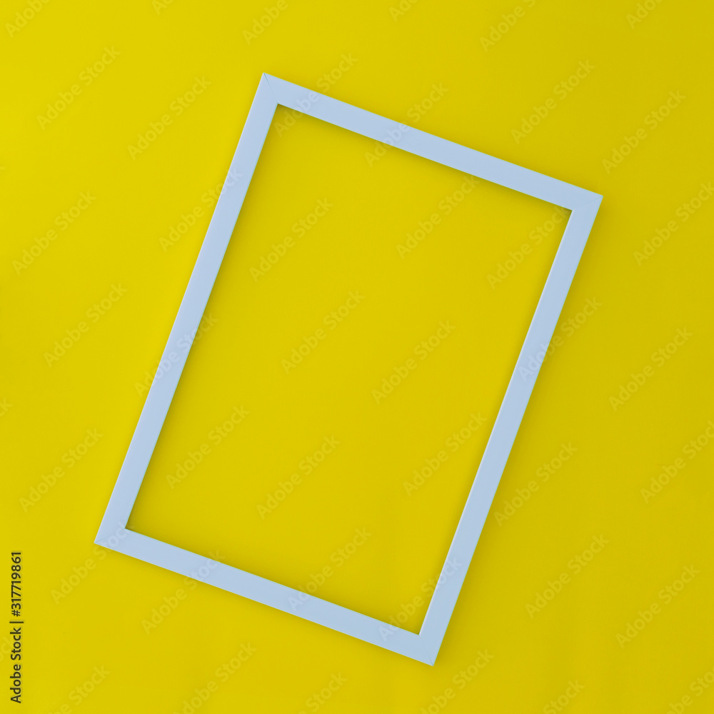 White minimalistic frame on a yellow background. White minimalistic frame on a yellow background.