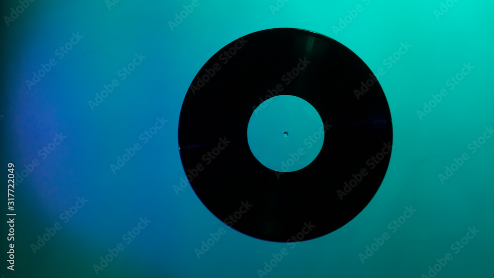 vinyl record on a green background vinyl record on a green background