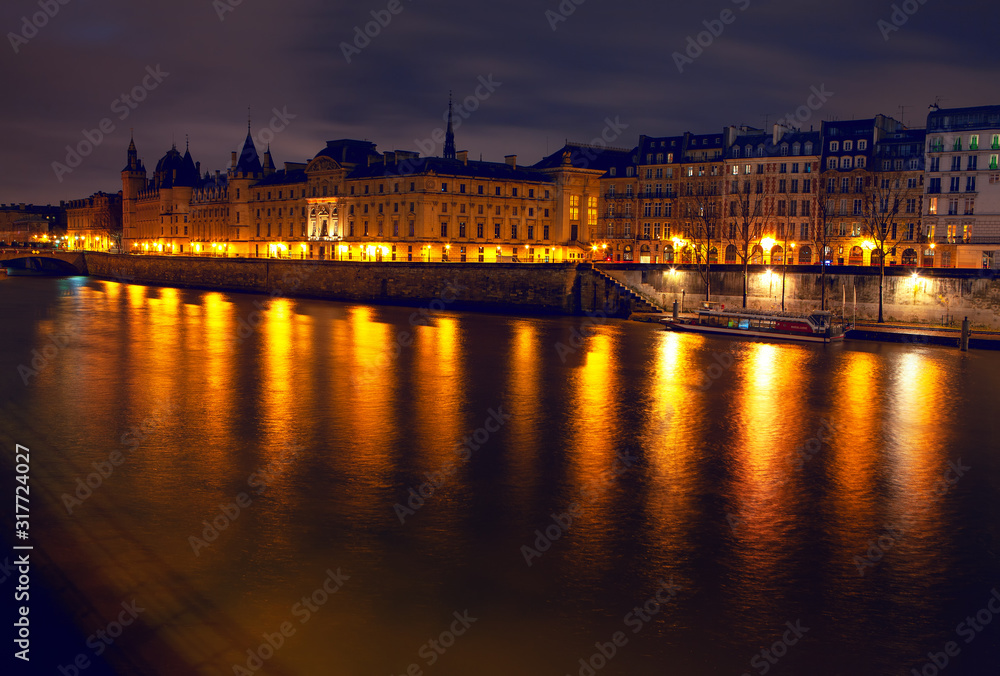Parisian Seine river in the night