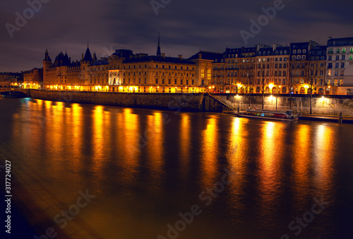 Parisian Seine river in the night