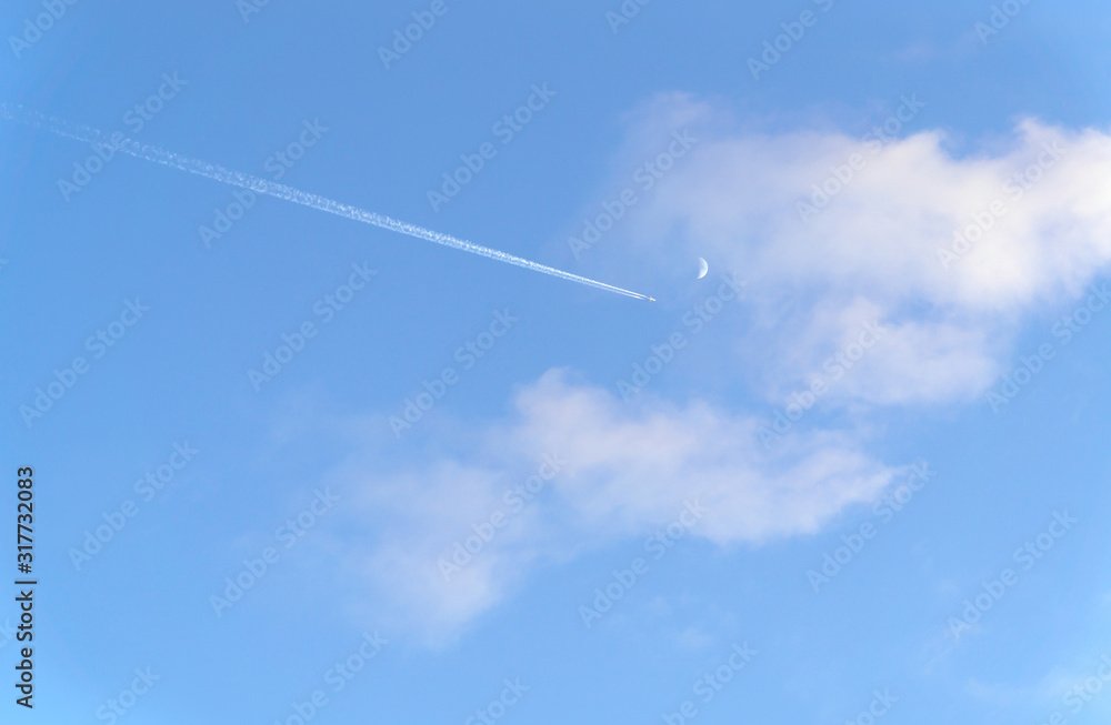 Clouds and blue sky on summer with airplane and moon. Clouds and blue sky on summer with airplane and moon.