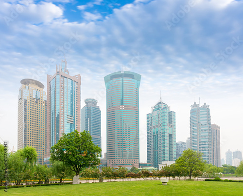 city park with modern building background in shanghai © zorabc