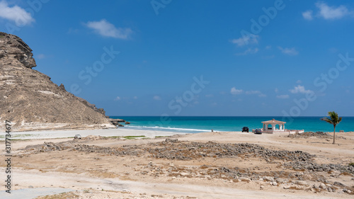 nice view on the Mughsail Beach, Salalah Oman. Fantastic seascape of Indian Ocean. Great outdoor scene of  Beauty of nature concept background, blue sea, blue sky, few clouds, light sandy beach