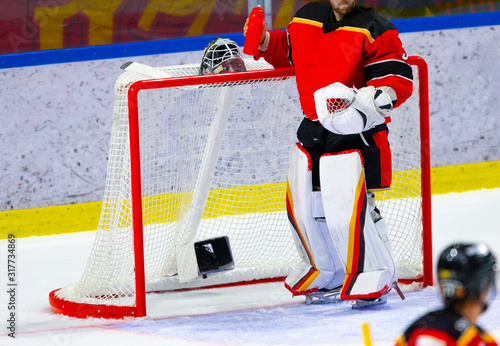 Photography Ice hockey goalie taking a short break