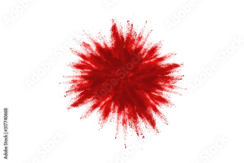 Tableau sur toile Launched red powder on white background.