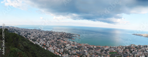 panoramic sight of Jounieh, Kaslik and the coast until Beirut in a far end photo