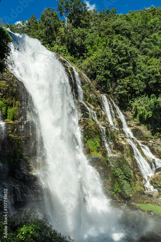 Waterfall with rocks in the middle of the jungle