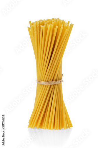 Bucatini or perciatelli - thick spaghetti-like pasta with a hole running through the center isolated on white