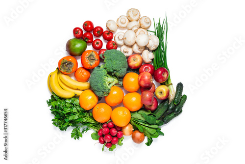 Variety of fresh fruits, vegetables, mushrooms and greens isolated over white. Clipping path at 400%