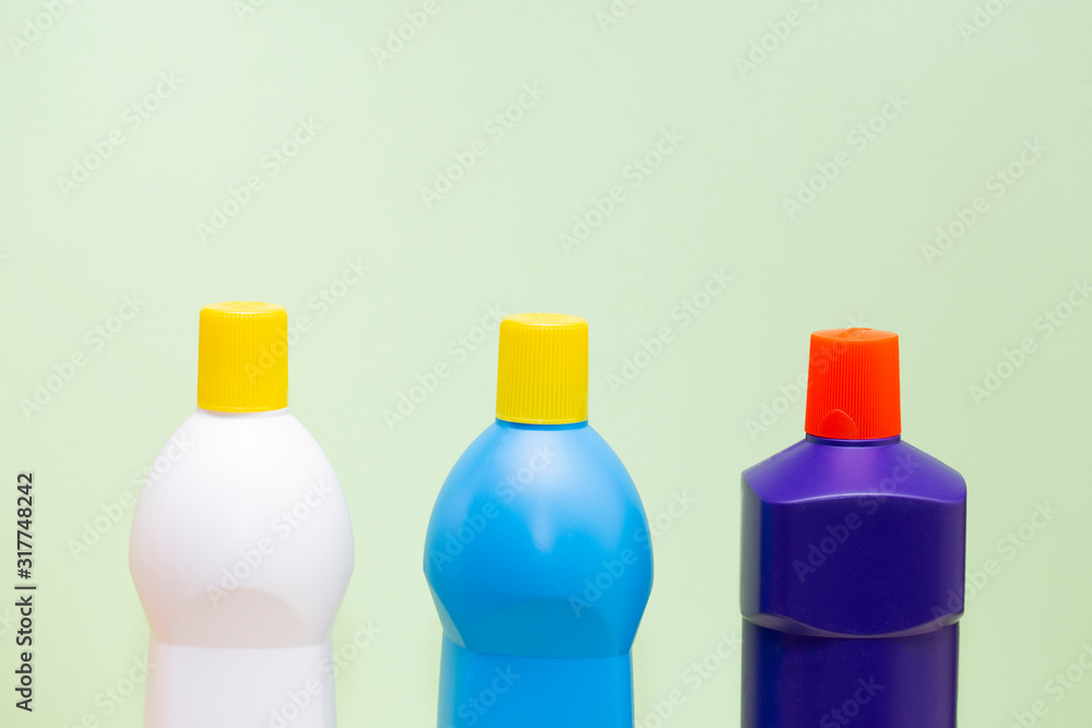 House cleaning product on green background House cleaning product on green background