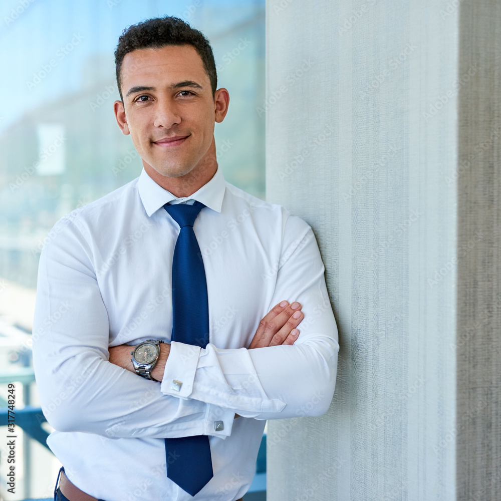 Confident young executive in an office Confident young executive in an office
