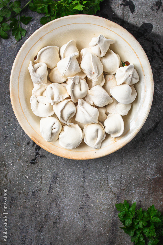 tortellini with filling (ravioli dumplings) menu concept. food background. top view. copy space tortellini with filling (ravioli dumplings) menu concept. food background. top view. copy space