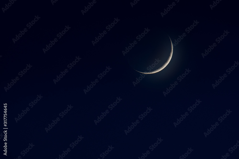 the Moon in early waxing lunar phase the Moon in early waxing lunar phase