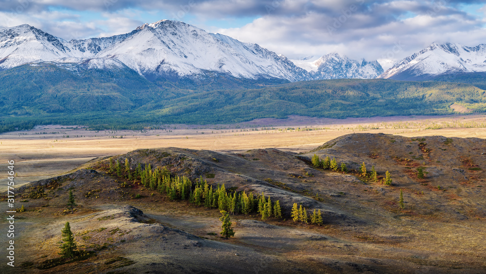 Morning in the Kurai steppe, view of the North Chuysky ridge. Panorama. Kosh-Agachsky District, Altai Republic, Russia