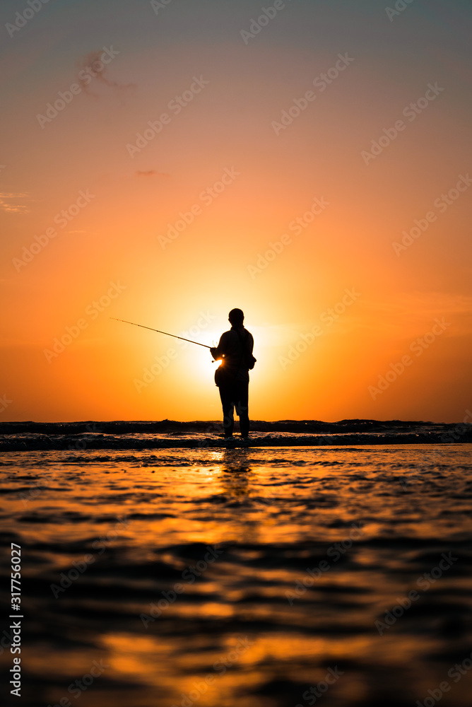 Sunset Fishing in Bali Silhouette