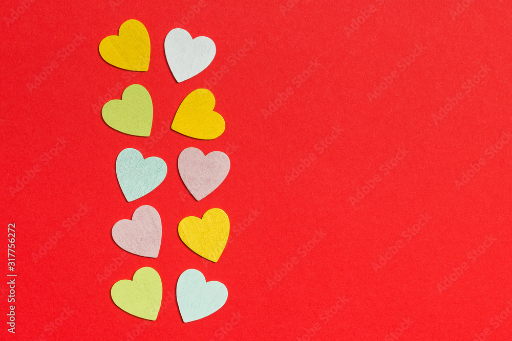 Top view of wooden hearts on colorful background with copy space. Romantic concept. St Valentine's Day