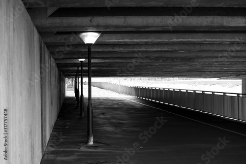 Under the bridge tunnel with light post