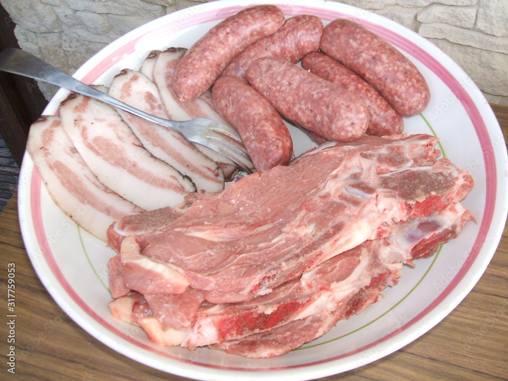 raw meat on a cutting board