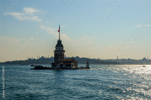 Daylight view of Maidens Tower with Asian side of Istanbul in the backgrond, lighthouse, Turkey 