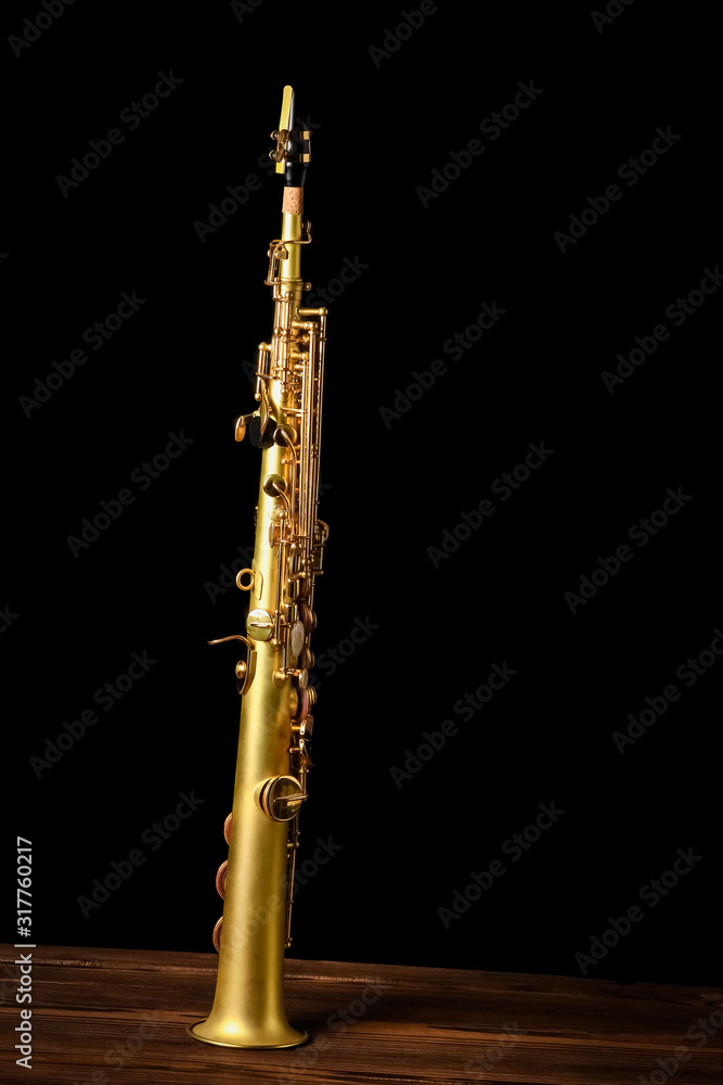 soprano saxophone on black background soprano saxophone on black background