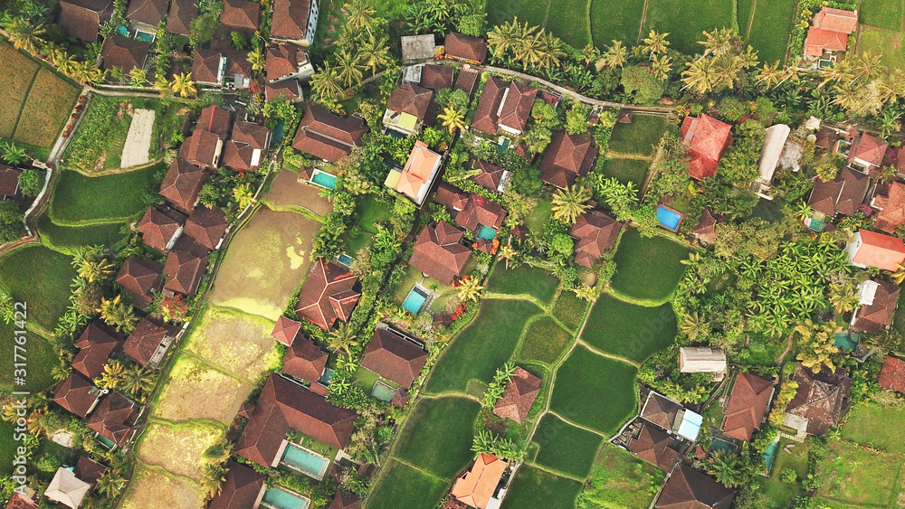 Aerial top view on bali houses with swimming pools Aerial top view on bali houses with swimming pools