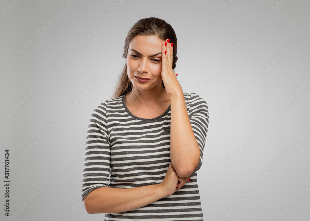 Woman felling a headache Woman felling a headache