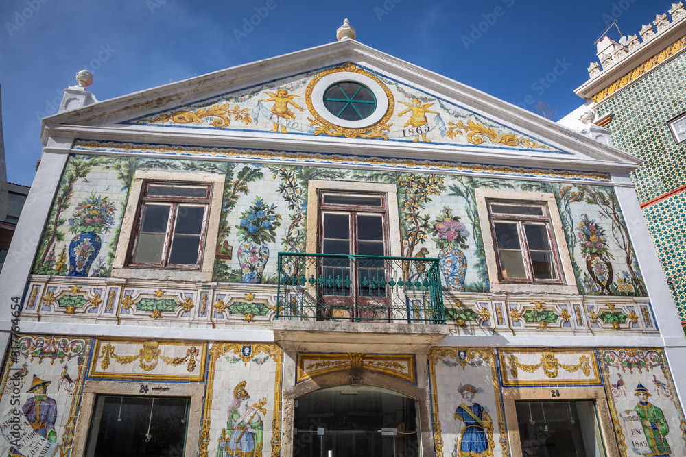 Beautiful tile-covered facade of the Viúva Lamego tile factory at Largo do Intendente square. Lisbon, Portugal.