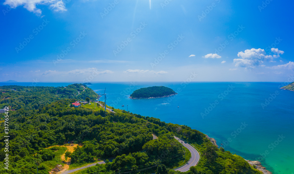 Ya Nui beach and Promthep Cape Viewpoint, Phuket island, Thailand. Aerial sea view with coral reefs, islands covered with jungle, beach with fine yellow sand. Paradise tropical landscape of Asia