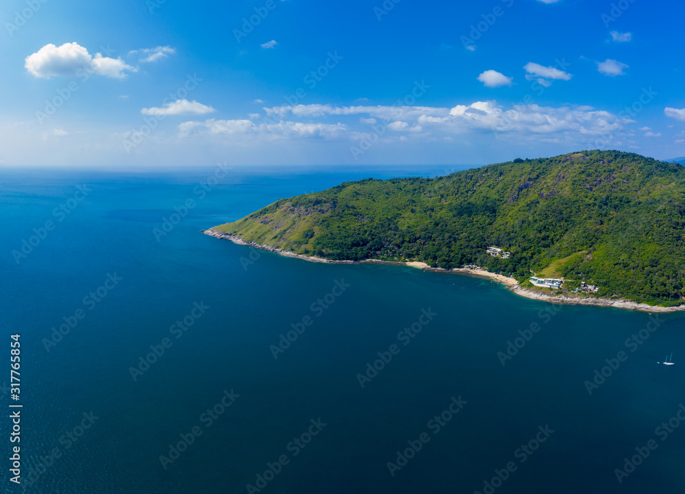 Ya Nui beach and Promthep Cape Viewpoint, Phuket island, Thailand. Aerial sea view with coral reefs, islands covered with jungle, beach with fine yellow sand. Paradise tropical landscape of Asia Ya Nui beach and Promthep Cape Viewpoint, Phuket island, Thailand. Aerial sea view with coral reefs, islands covered with jungle, beach with fine yellow sand. Paradise tropical landscape of Asia
