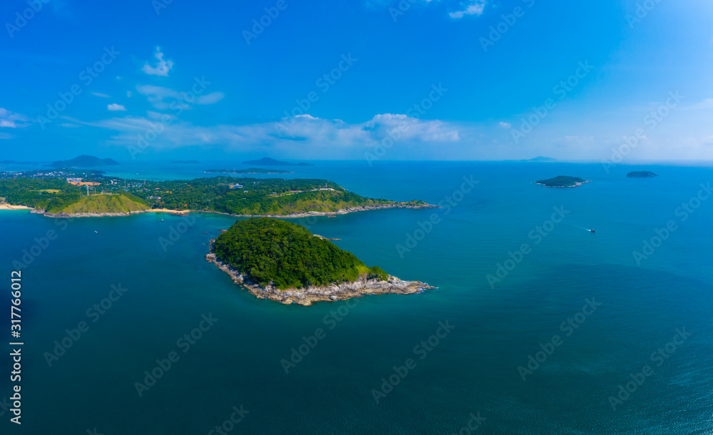 Ya Nui beach and Promthep Cape Viewpoint, Phuket island, Thailand. Aerial sea view with coral reefs, islands covered with jungle, beach with fine yellow sand. Paradise tropical landscape of Asia Ya Nui beach and Promthep Cape Viewpoint, Phuket island, Thailand. Aerial sea view with coral reefs, islands covered with jungle, beach with fine yellow sand. Paradise tropical landscape of Asia