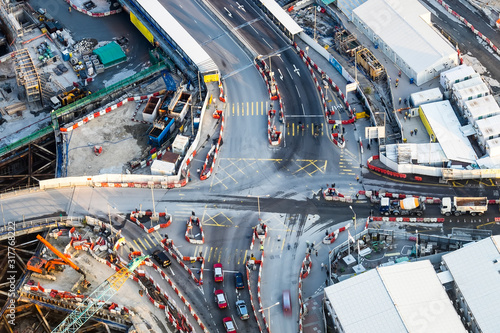 Aerial view of busy crossroad with moving cars. Hong Kong
