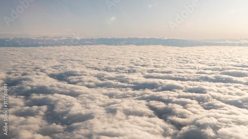 view from the plane to the clouds