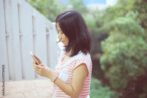 Young asian woman in casual...