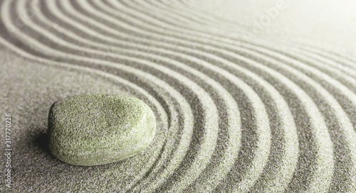 Zen stone on the sand. Meditation concept