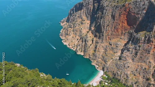 Beautiful bay in the mountains with clear turquoise water. Drone shot