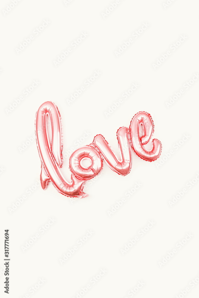 love. word love multi-colored gel balloons on a white background on valentines day